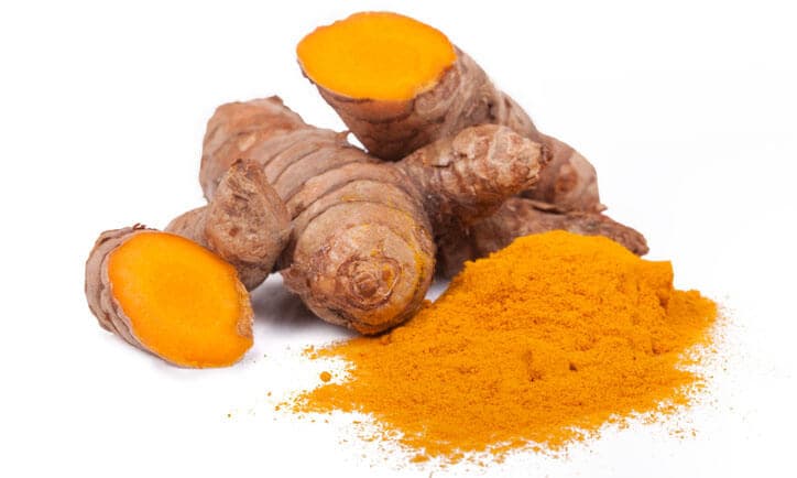 Studio shot on white background with natural reflections of fresh and dried turmeric. (cÃºrcuma Longa) kurkum